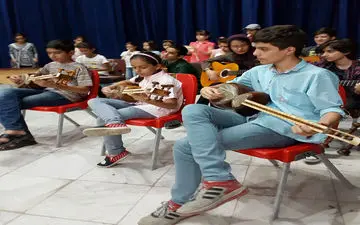 به روایت تصویر تمرین  ارکستر سمفونیک آکادمی  موسیقی دانوش برای اجرا در هفته دولت 