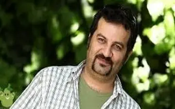 مهراب قاسمخانی به همراه همسر و دخترش در چالوس