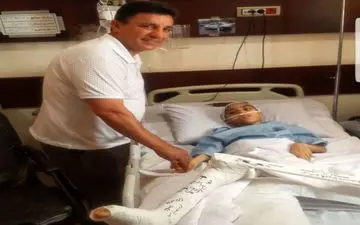 برآورده شدن آرزوی کودک توسط مربی لیگ برتری (عکس)