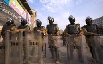 درگیری نیروهای امنیتی و معترضان در کربلا