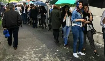 عکس/ رای دادن ایرانی‌های میلان در زیر باران