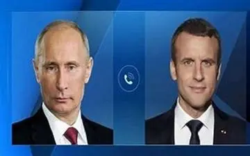 ماکرون و پوتین باهم گفتگو می کنند
