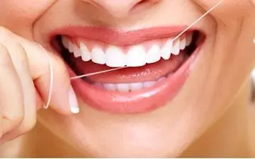 چه زمانی باید نخ دندان استفاده کنیم؟