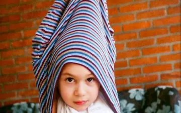 چرا کودک نوپا لباس و پوشک خود را در می آورد؟