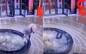 زن حواس پرت داخل حوض پر آب فروشگاه افتاد +فیلم 