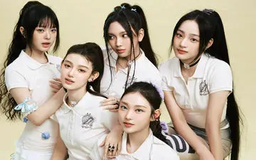 عکسی از رضا گلزار با گروه موسیقی کره‌ای نیوجینز!