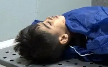 تصویری تلخ از پیکر بی جان طاها کوچولو قربانی حادثه تروریستی اهواز 