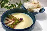 طرز تهیه فرنی آرد ذرت خانگی با طعمی لطیف و خوشمزه + نکات و فوت‌وفن حرفه‌ای