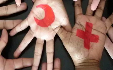 واریز کمک نقدی صلیب سرخ به حساب هلال احمر