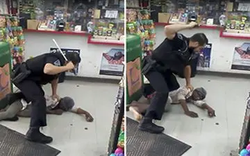 رفتار بی رحمانه مامور پلیس آمریکا با یک زن + فیلم