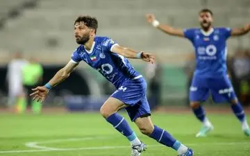 تیم ملی به سید حسین حسینی و روزبه چشمی نیاز دارد+ پوستر 