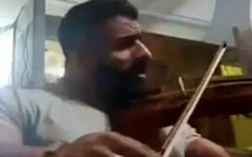  ویولن نوازی و خوانندگی هادی چوپان قهرمان پرورش‌اندام جهان