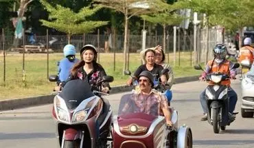 موتورسواری رضا عطاران در تایلند، به همراه یک زن تایلندی! (عکس)