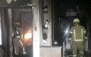  نجات ۲۰ نفر از میان آتش و دود + تصاویر