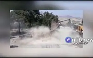 خاموش کردن پیکان آتش گرفته با لودر