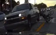 تصادف دوچرخه با خودرو در فلوریدا + فیلم
