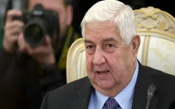 اعطای نشان عالی بشار اسد به ولید معلم