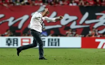 عکس/ شادی کی‌روش پس از دیدار ایران و کره‌