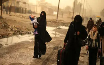  اقدام تحسین برانگیز یک خبرنگار در موصل + عکس 