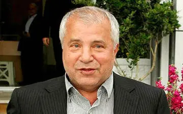 علی پروین سوار موتور در خیابان +عکس