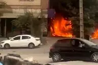 برخورد تریلی حامل تیرآهن به یک مجتمع تجاری در پردیس باعث آتش سوزی شد