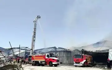 مهار آتش‌سوزی در انبار دانه‌های روغنی بندر امام