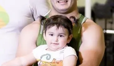 دختر قوی ترین مرد ایران در آغوش قهرمان وزنه برداری + عکس