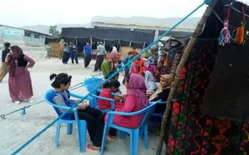 نمایشگاه صنایع دستی و  غدایی بومی و محلی روستای زلزله‌زده کوئیک حسن توسط جوانان این روستا به روایت تصویر