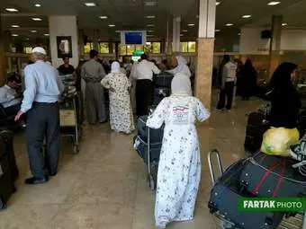 بازگشت حجاج از سرزمین وحی در فرودگاه کرمانشاه 