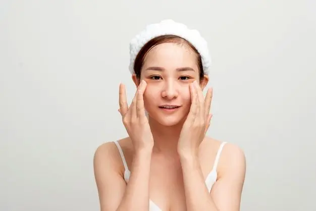 Premium Photo | Beautiful woman doing facial massage touching her face