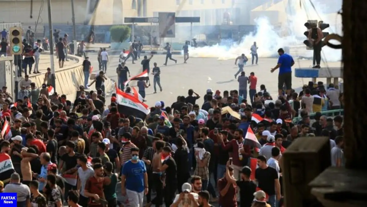 وزیر دفاع عراق: طرف سومی به سمت معترضان شلیک می‌کند