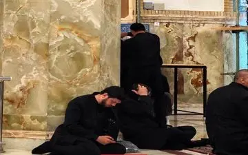 عکسی از محافظ آیت الله رئیسی در مراسم تشییع