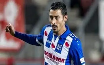 فوتبالیست مشهور ایرانی و همسر معروفش در خارج از ایران