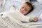 علل لبخند زدن نوزادان در خواب چیست؟