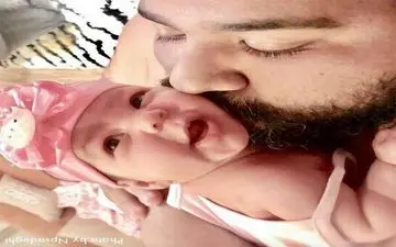 رضا صادقی در حال بوسیدن دختر زیبایش +‌ عکس