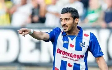 ژست جالب فوتبالیست ایرانی و پسرش در خارج از کشور