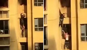 عملیات خطرناک دو شهروند چینی برای فرار از آپارتمان در حال سوختن + فیلم 