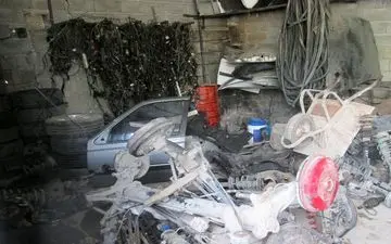 کشف انبار بزرگ اوراق خودروهای سرقتی در کنگاور 