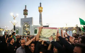 تشییع پیکر شهید مدافع حرم مجید قربانخانی در حرم مطهر رضوی
