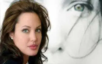 راز تاتوی روی بازوی بازیگر زن مشهور لو رفت 