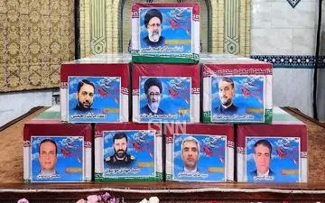 تابوت شهدای خدمت در جایگاه یادبود سالن اجلاس سران قرار گرفت + ویدئو