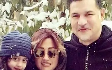 علی دایی و همسرش در برف دیروز! 