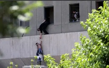 عکس کودک حادثه تروریستی مجلس در میان تصاویر برتر سال رویترز