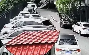 فرار معجزه آسای مادر و فرزند در آغوشش از حادثه نشست زمین در آخرین لحظه+فیلم