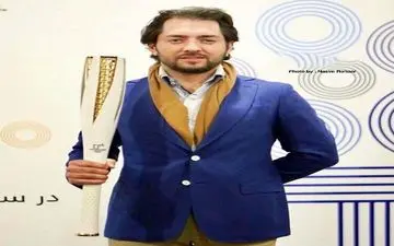 مشعل المپیک در دستان بهرام رادان/عکس