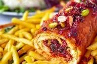 طرز تهیه زرشک پلو با رول مرغ شکم‌ پر؛ غذای مجلسی با طعمی بی‌نظیر