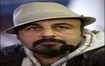 تصویری از رضا عطاران کنار هنرپیشه خانم در آمریکا 