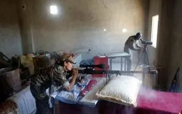 دختر تک‌تیرانداز کُرد، سوژه شد + عکس