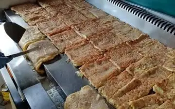 مهارت آشپزی در تایوان: سفری به دنیای غذاهای خیابانی و پخت املتی غول‌پیکر (ویدئو)