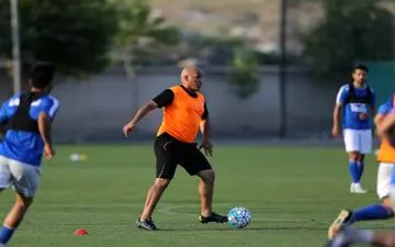 حضور جباری در تمرینات گروهی و بارش شدید باران 